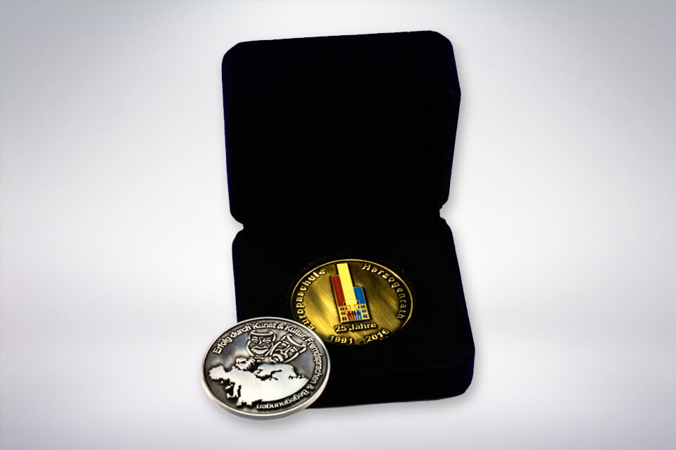 Zander Papier & Pokale Referenzen Medaille Europaschule Herzogenrath