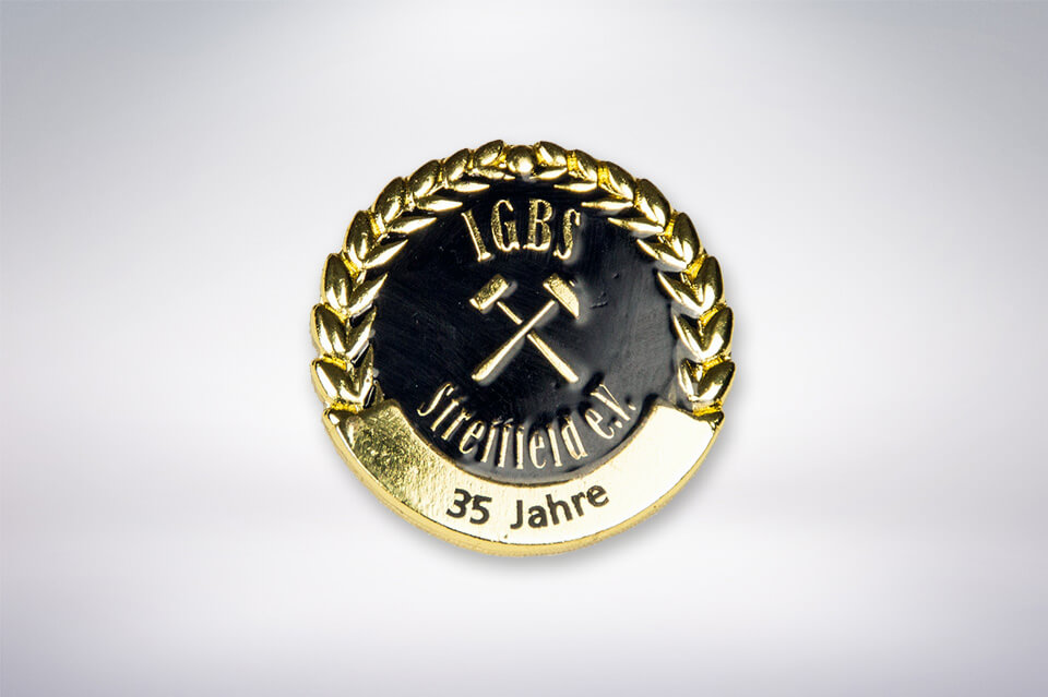 Zander Papier & Pokale Referenzen Pin IGBS Streitfeld